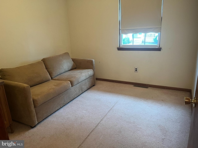 300 W New St, Glassboro, NJ 08028 - living area featuring carpet floors and baseboards