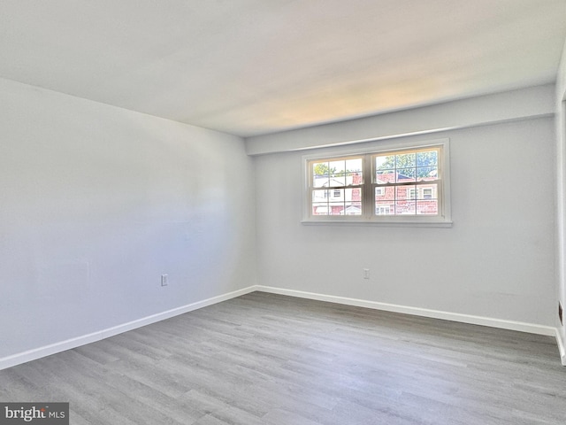 1504 Bonwood Rd, Wilmington, DE 19805 - spare room featuring wood finished floors and baseboards