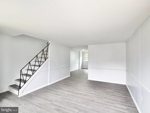 1504 Bonwood Rd, Wilmington, DE 19805 - unfurnished living room with wood finished floors and stairs