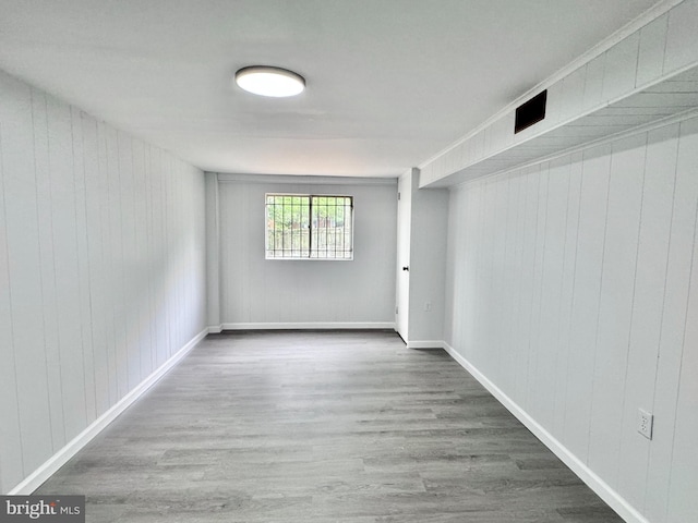 1504 Bonwood Rd, Wilmington, DE 19805 - empty room featuring wood finished floors and wood walls