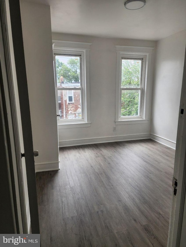 25 N 28th St, Camden, NJ 08105 - unfurnished room with dark wood finished floors and baseboards