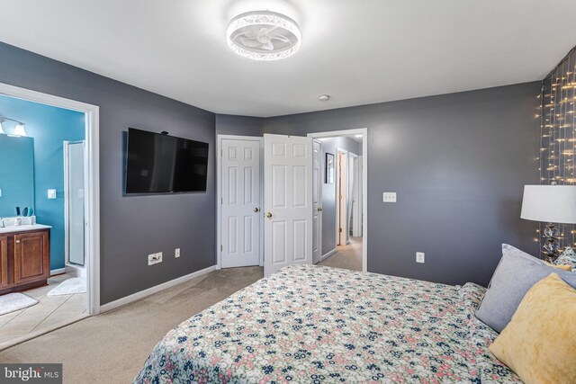 107 Pelican Cv, Stafford, VA 22554 - bedroom with light colored carpet and connected bathroom