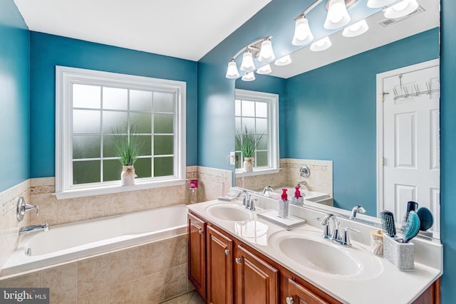 107 Pelican Cv, Stafford, VA 22554 - bathroom with a bath and double vanity