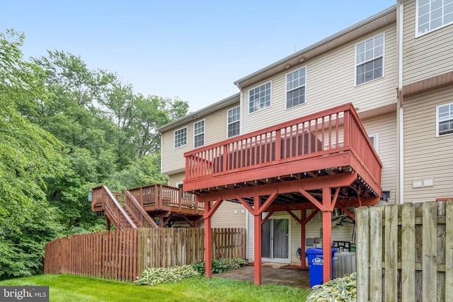 107 Pelican Cv, Stafford, VA 22554 - rear view of property with a wooden deck and stairway