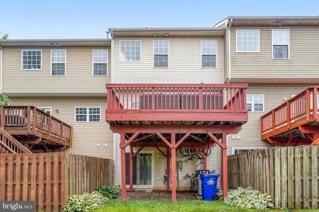 107 Pelican Cv, Stafford, VA 22554 - rear view of property with a wooden deck and a fenced backyard