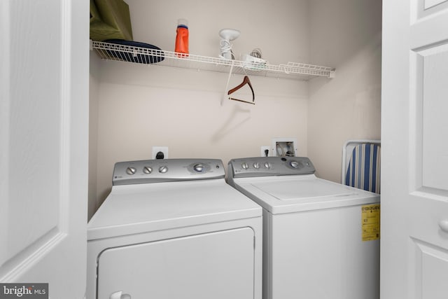 12000 Market St Unit 378, Reston, VA 20190 - laundry room with washing machine and clothes dryer