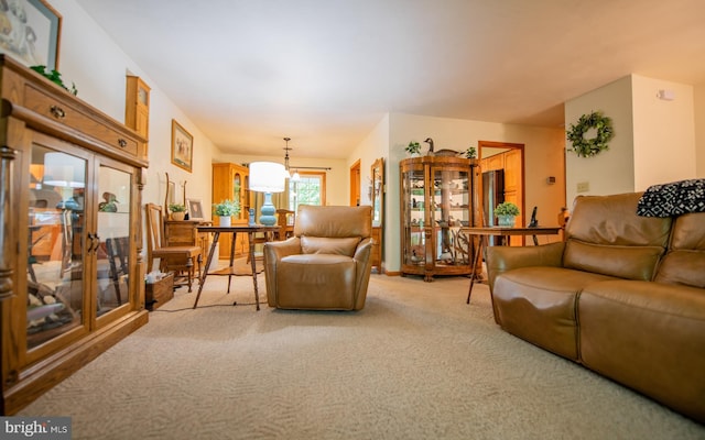 1 Emerald St, Mill Hall, PA 17751 - carpeted living room with a chandelier