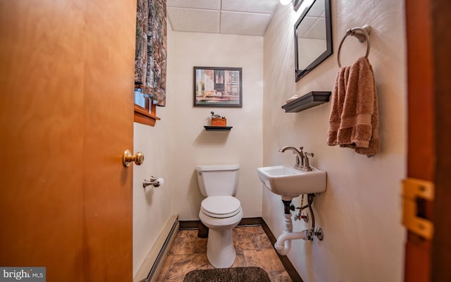 1 Emerald St, Mill Hall, PA 17751 - half bathroom featuring baseboard heating and a paneled ceiling