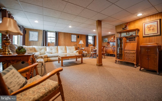 1 Emerald St, Mill Hall, PA 17751 - carpeted living area featuring healthy amount of natural light, wood walls, recessed lighting, and a drop ceiling