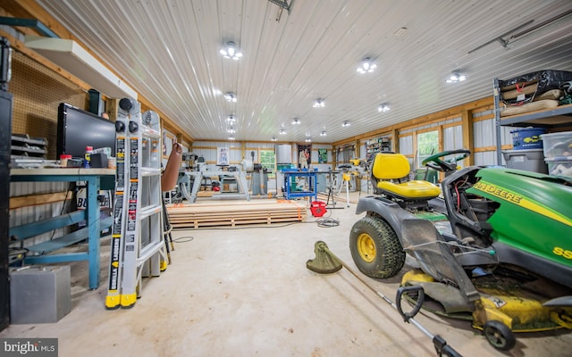 1 Emerald St, Mill Hall, PA 17751 - garage featuring a workshop area