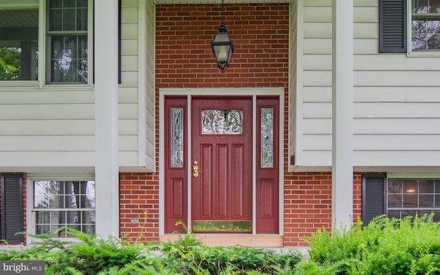 1 Emerald St, Mill Hall, PA 17751 - property entrance featuring brick siding