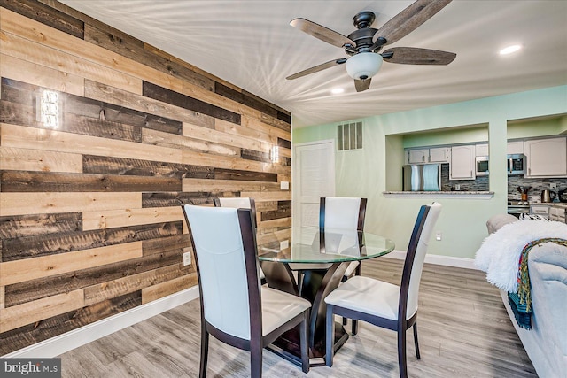 108 Wrangel Ct Unit 1, Princeton, NJ 08540 - dining area featuring wood walls, a ceiling fan, wood finished floors, and recessed lighting