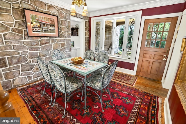 1722 Swamp Pike, Gilbertsville, PA 19525 - dining area featuring hardwood / wood-style floors, crown molding, and healthy amount of natural light