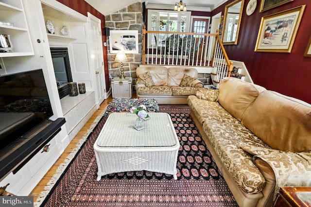 1722 Swamp Pike, Gilbertsville, PA 19525 - living area with a glass covered fireplace, wood finished floors, crown molding, and stairway