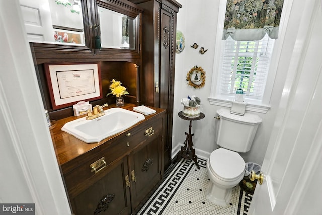 1722 Swamp Pike, Gilbertsville, PA 19525 - half bath featuring vanity, tile patterned flooring, and inlaid floor details