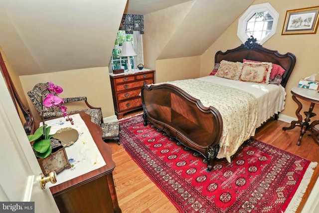 1722 Swamp Pike, Gilbertsville, PA 19525 - bedroom featuring wood finished floors and vaulted ceiling