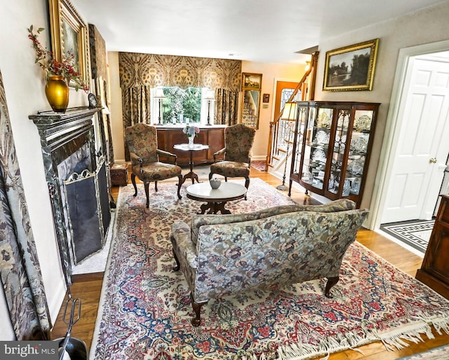 1722 Swamp Pike, Gilbertsville, PA 19525 - sitting room featuring a fireplace, wood finished floors, and stairs