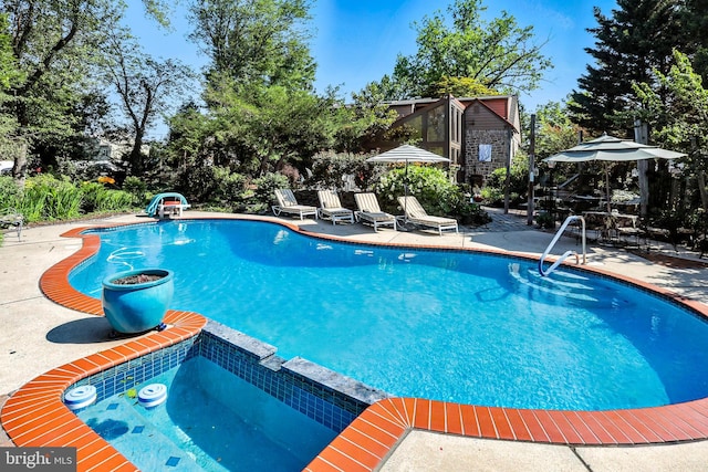 1722 Swamp Pike, Gilbertsville, PA 19525 - view of pool with a patio area and a pool with connected hot tub