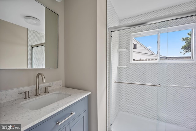 116 Hollow Rd, Levittown, PA 19056 - bathroom with healthy amount of natural light, vanity, and a stall shower