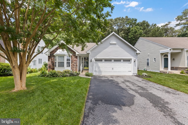 32618 Seaview Loop, Millsboro, DE 19966 - ranch-style house featuring asphalt driveway, a garage, a front yard, and stone siding