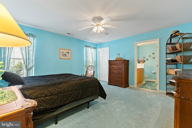 32618 Seaview Loop, Millsboro, DE 19966 - bedroom featuring carpet, connected bathroom, and ceiling fan