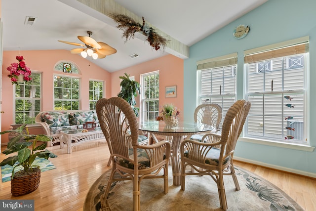 32618 Seaview Loop, Millsboro, DE 19966 - dining area featuring lofted ceiling, a ceiling fan, healthy amount of natural light, and wood finished floors