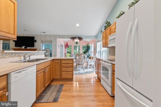 32618 Seaview Loop, Millsboro, DE 19966 - kitchen featuring white appliances, light wood finished floors, healthy amount of natural light, decorative backsplash, and recessed lighting
