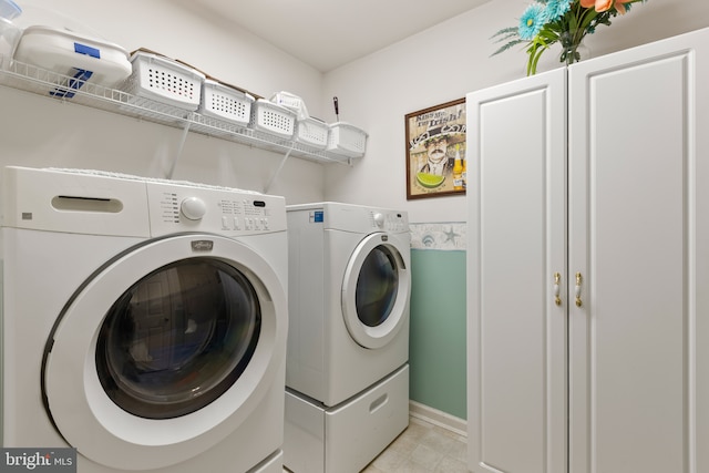 32618 Seaview Loop, Millsboro, DE 19966 - washroom with independent washer and dryer and light tile patterned floors