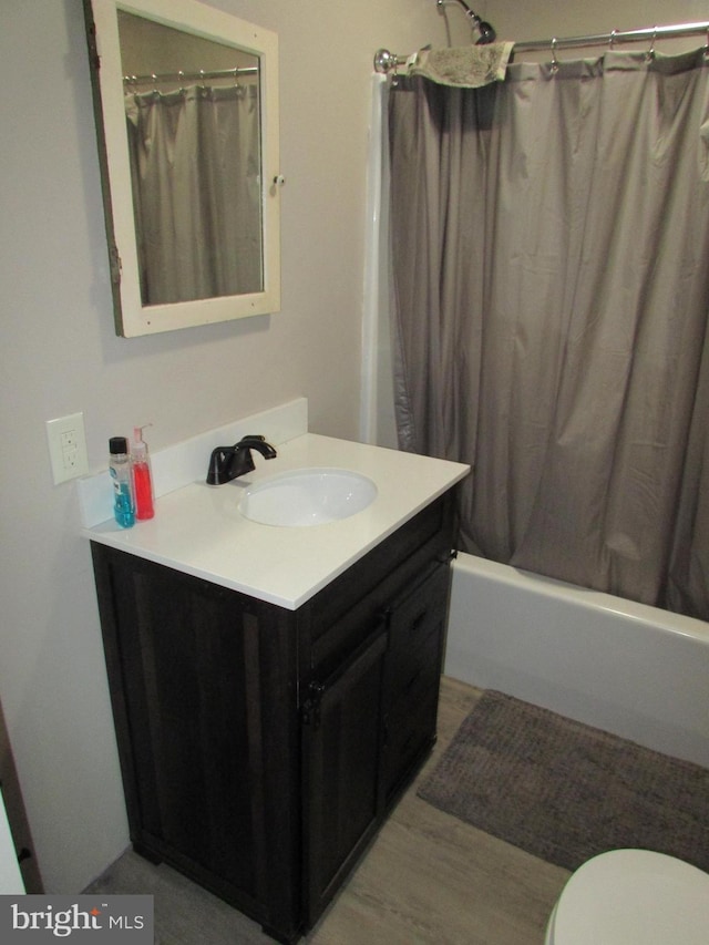293 Snow Shoe Mountain Forest Rd, Snow Shoe, PA 16874 - full bathroom featuring vanity, shower / bath combination with curtain, and wood finished floors