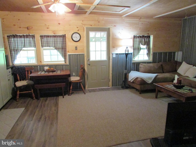 293 Snow Shoe Mountain Forest Rd, Snow Shoe, PA 16874 - living room with ceiling fan, wood walls, and wood finished floors