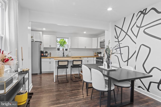 5117 Duel Pl, Capitol Heights, MD 20743 - dining space with recessed lighting and dark wood finished floors