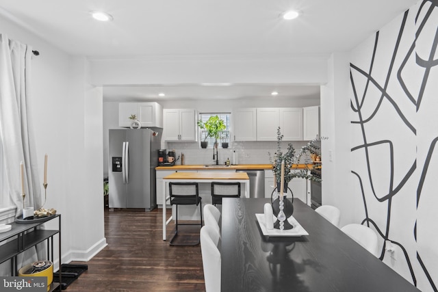 5117 Duel Pl, Capitol Heights, MD 20743 - dining area with dark wood-style flooring and recessed lighting