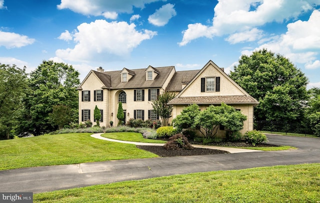 4 Taylor Chase Ln, West Chester, PA 19382 - view of front of home featuring a chimney, a front yard, and stucco siding