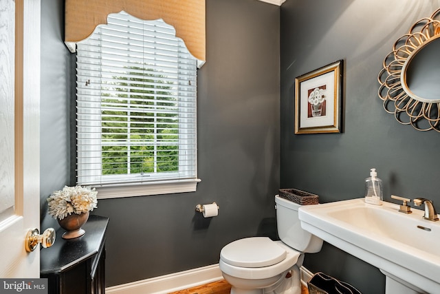 4 Taylor Chase Ln, West Chester, PA 19382 - half bath featuring toilet and baseboards