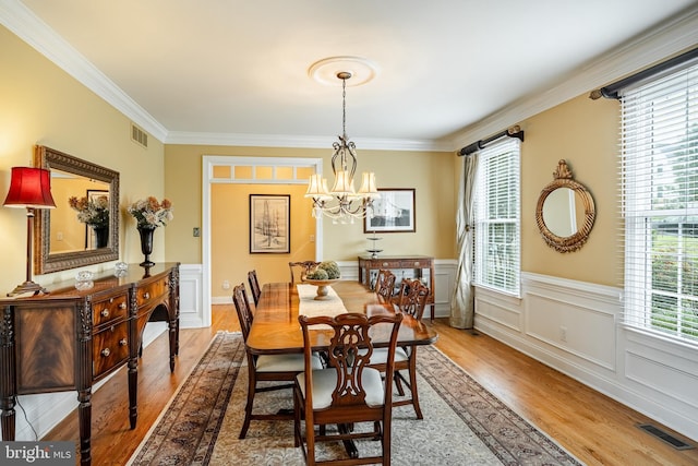 4 Taylor Chase Ln, West Chester, PA 19382 - dining area featuring a chandelier, wood finished floors, crown molding, and wainscoting