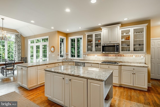 4 Taylor Chase Ln, West Chester, PA 19382 - kitchen with appliances with stainless steel finishes, a center island, open shelves, light wood finished floors, and recessed lighting
