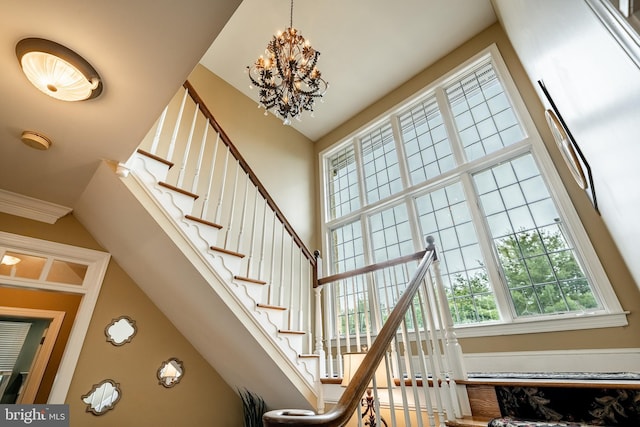 4 Taylor Chase Ln, West Chester, PA 19382 - staircase featuring a towering ceiling and a chandelier