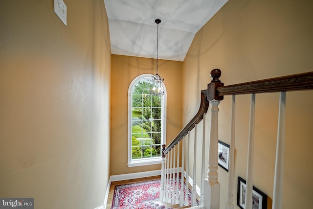 4 Taylor Chase Ln, West Chester, PA 19382 - stairs featuring a chandelier, wood finished floors, and vaulted ceiling