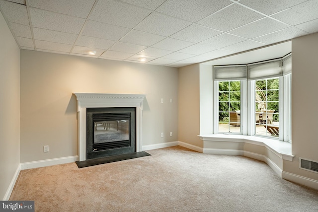 4 Taylor Chase Ln, West Chester, PA 19382 - unfurnished living room featuring carpet floors, a fireplace with flush hearth, and a paneled ceiling