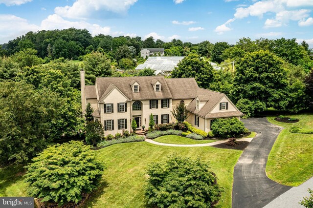 4 Taylor Chase Ln, West Chester, PA 19382 - georgian-style home with stucco siding and a front lawn