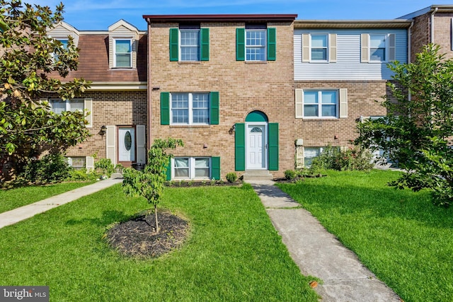 8 Tatler Pl, Owings Mills, MD 21117 - view of property featuring brick siding and a front yard