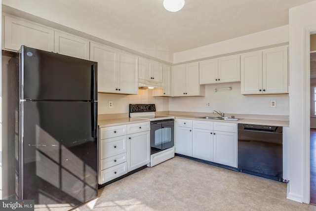 8 Tatler Pl, Owings Mills, MD 21117 - kitchen with black appliances, under cabinet range hood, light countertops, and white cabinetry