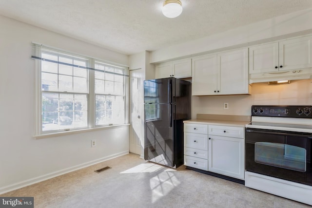 8 Tatler Pl, Owings Mills, MD 21117 - kitchen featuring range with electric stovetop, freestanding refrigerator, a textured ceiling, white cabinetry, and light countertops