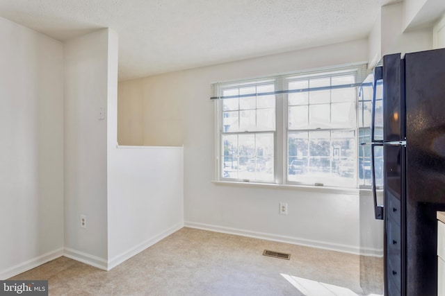 8 Tatler Pl, Owings Mills, MD 21117 - carpeted spare room featuring a textured ceiling