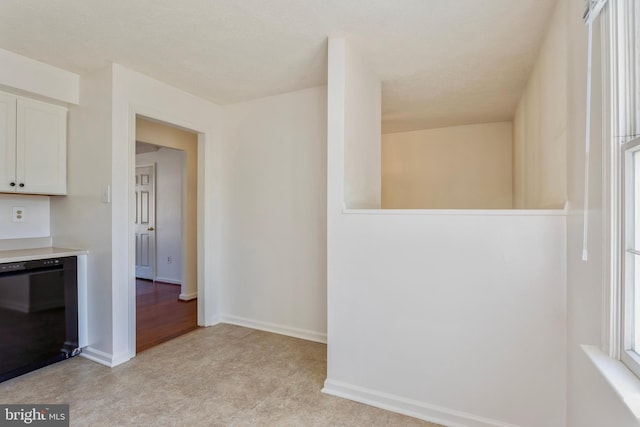 8 Tatler Pl, Owings Mills, MD 21117 - kitchen with dishwasher, white cabinetry, and light countertops