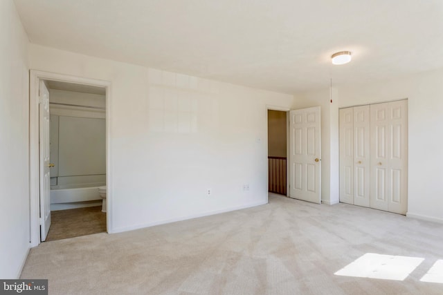 8 Tatler Pl, Owings Mills, MD 21117 - unfurnished bedroom featuring carpet flooring, connected bathroom, and a closet