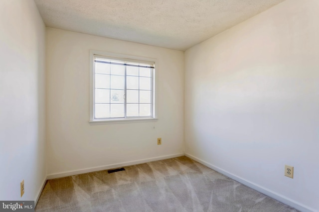 8 Tatler Pl, Owings Mills, MD 21117 - carpeted empty room with baseboards and a textured ceiling