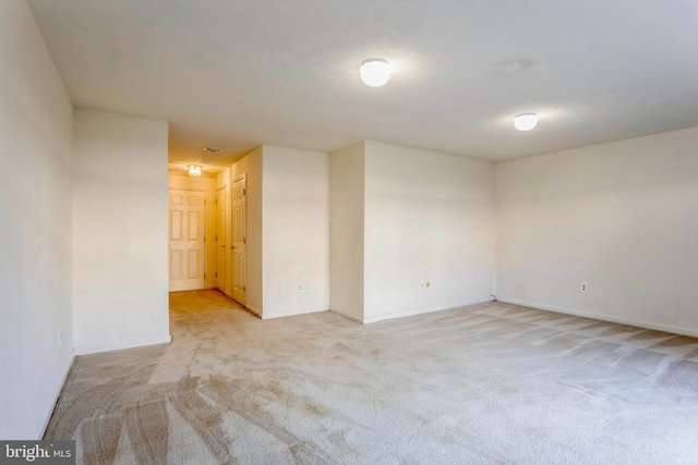 8 Tatler Pl, Owings Mills, MD 21117 - unfurnished room with light colored carpet and baseboards