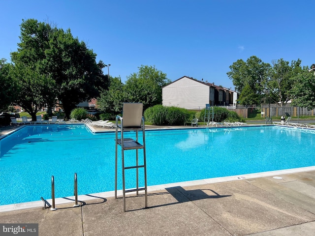 8 Tatler Pl, Owings Mills, MD 21117 - community pool featuring a patio