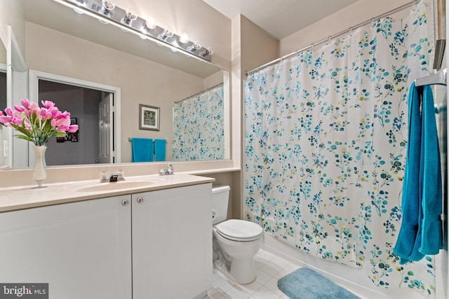 9480 Virginia Center Blvd Unit 327, Vienna, VA 22181 - bathroom featuring tile patterned floors, vanity, and shower / bath combination with curtain